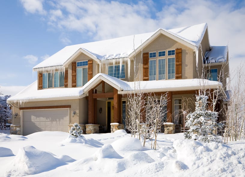 Heavy Snow Covered House | Piedmont Roofing