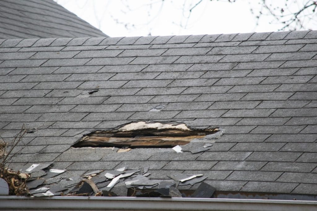Wind Damaged Roof Signs - Piedmont Roofing