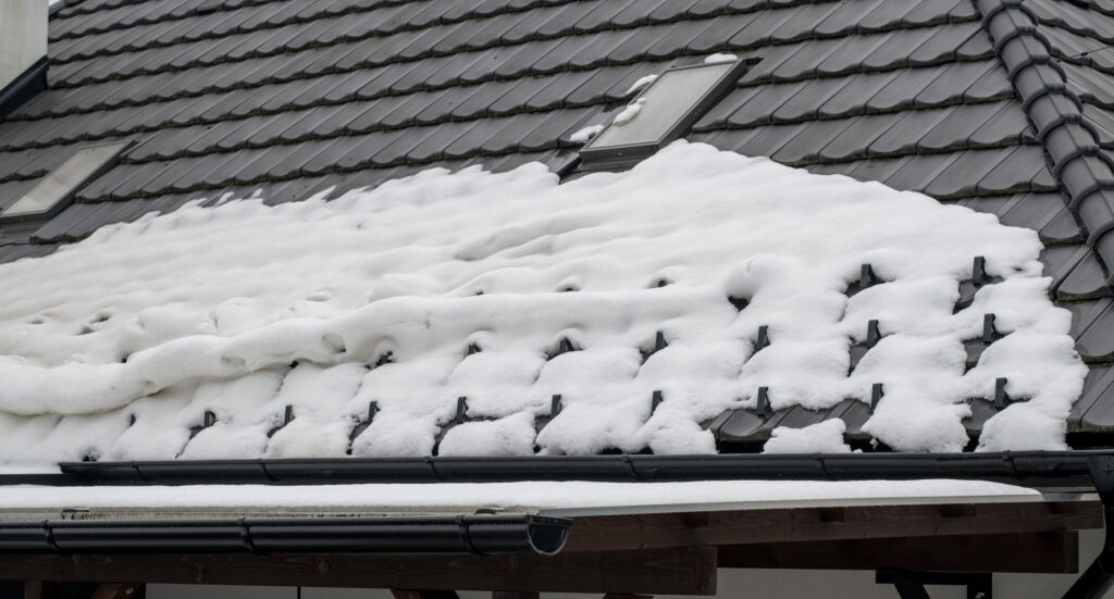 How Do Snow Guards Work? - Piedmont Roofing